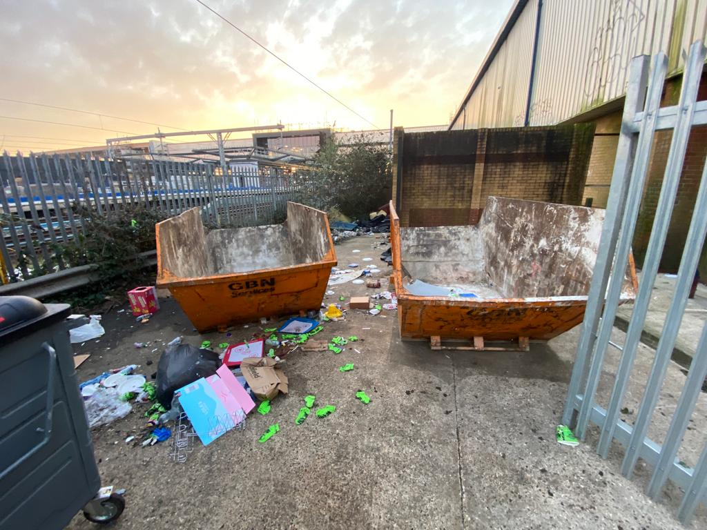 Skip area in London needing clean up