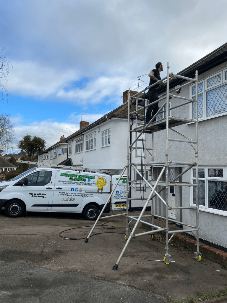 Prestige bin cleaning worker cleaning london homes home exterior