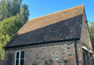 garage roof cleaning for residential client before