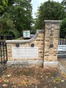 Gate Wall & Sign - Before Brick Cleaning