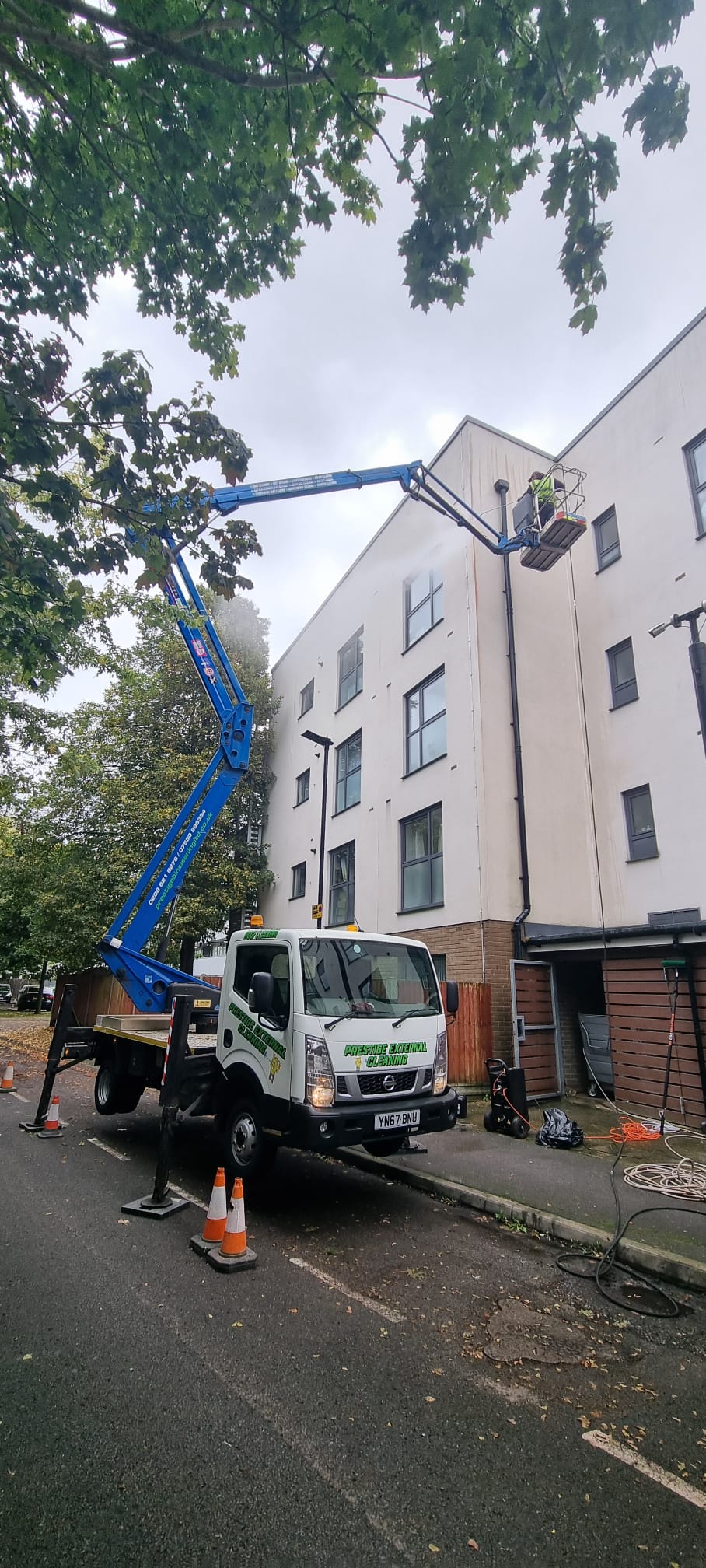 Render Cleaning services with our cherry picker