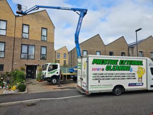 Roof cleaning on tall residential properties with cherry picker