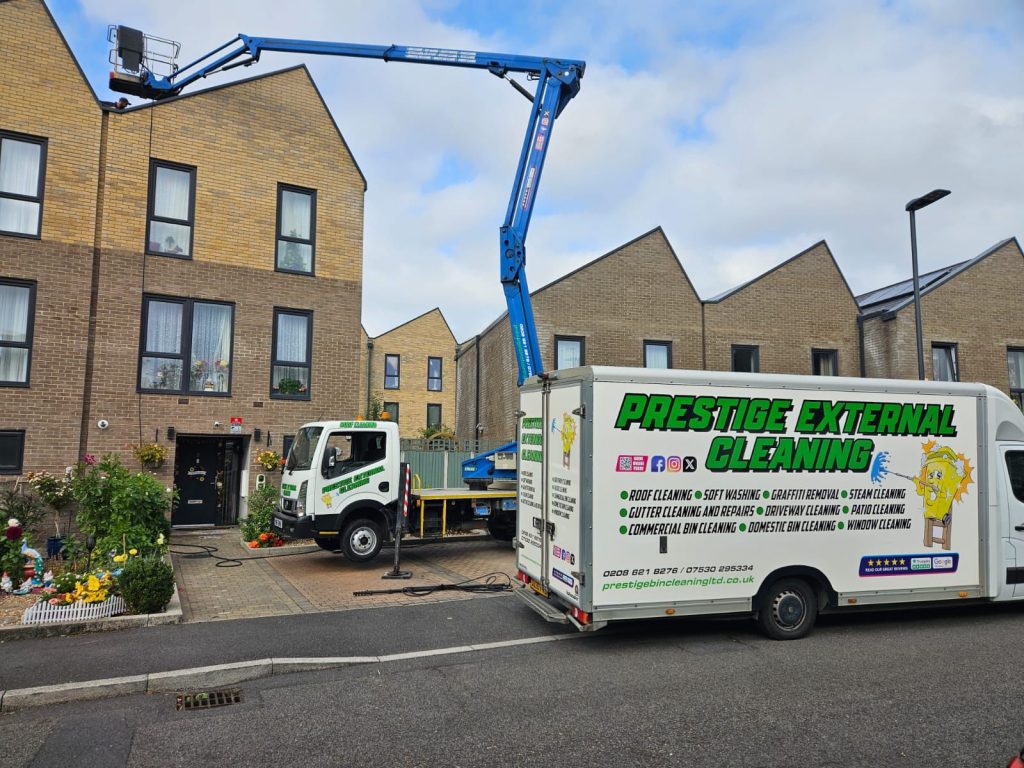 Roof cleaning in Esher with cherry picker