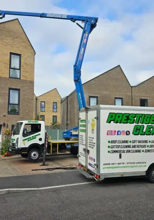 Roof cleaning in Shoreditch with cherry picker
