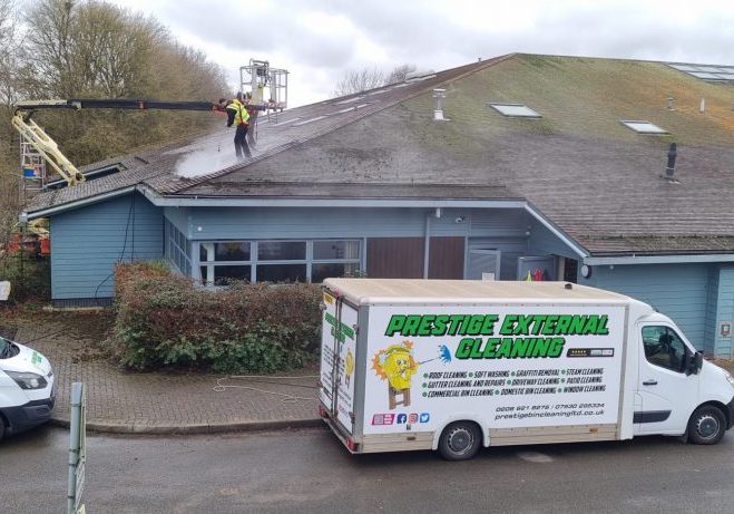 commercial roof cleaning and moss removal in Esher