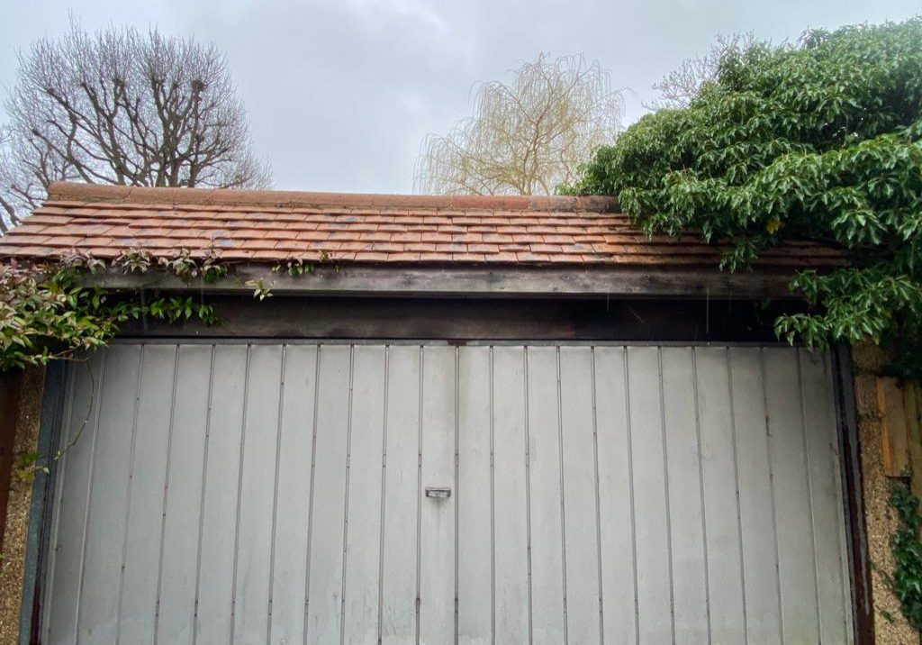 Garage roof before clean by Prestige Bin Cleaning